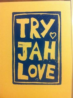 a blue and yellow sign that says try jah love