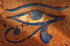 an egyptian eye painted on the side of a wall