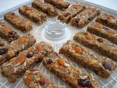 a bunch of granola bars on a cooling rack