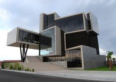 a modern building with stairs leading up to it