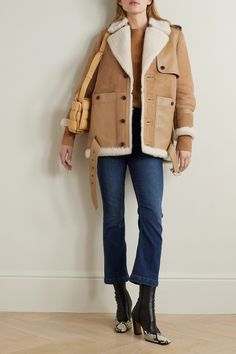 Shearling jackets are huge this season and FRAME's trench-inspired one is such a chic way to tap into the trend. It has a tonal leather storm flap and matching pockets and features the traditional shoulder epaulettes and belted hem. Shoulder Epaulettes, Next Clothes, Shearling Jacket, Fashion Updates, The Trend, Casual Jacket, Net A Porter, Moda Operandi, Daily Fashion