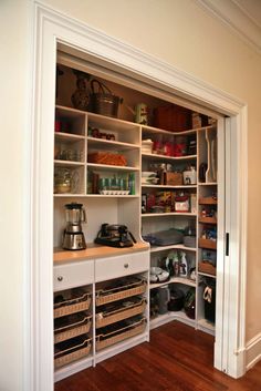 an open pantry with many items in it