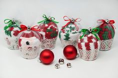 several christmas ornaments in red and white lace