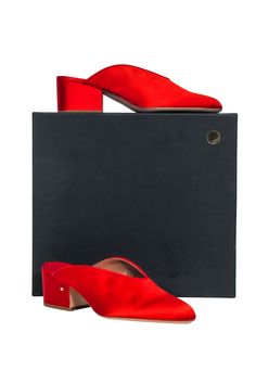 Take the holidays to new heights with these Laurence Dacade red satin mules! Featuring a rounded toe silhouette and statement block heel, these elegant heels will add a splash of festive color to any ensemble. Be a showstopper in these sassy holiday stunners! Size 10 (IT 40) Made in Italy Satin upper Lather sole and lining Slip on Round toe Block heel Comes with box and dust bag Heel height 2.5" Mule Heels, Elegant Heels, Creative Stuff, Buy Shoes Online, Red Satin, Luxury Shop, Mule, Heeled Mules, Block Heels