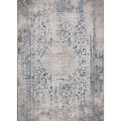 an area rug with blue and gray colors