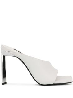 White leather Wilhemina I mules from Senso featuring an open toe, an asymmetric style and a slim block high heel. Modern Open Toe Mules With 4-inch Heel, Modern Evening Mules With Single Toe Strap, Sleek Mules With Wrapped Heel And Open Back, Sleek Mules For Spring Evening, Elegant Mules With Stacked Heel And Single Toe Strap, Chic Evening Mules With Single Toe Strap, Modern Mules With Single Toe Strap, Evening Mules With 4-inch Heel And Open Toe, Evening Open Toe Mules With 4-inch Heel