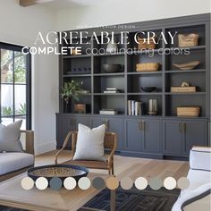 a living room filled with lots of furniture and decor on top of a hard wood floor