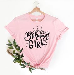 🎈 Happy birthday! Show up to your next birthday party in style with this eye-catching pink t-shirt that declares "Birthday Girl" for the lady of the hour! Or, a perfect gift for a friend for a night out on the town. This just might be the softest and most comfortable women's t-shirt you'll ever own. Combine the relaxed fit and smooth fabric of this tee with jeans to create an effortless every-day outfit with our birthday shirts, or dress it up with a jacket and dress pants for a business casual Pink Crew Neck Top For Birthday, Pink T-shirt For Birthday In Summer, Pink Summer T-shirt For Birthday, Pink Letter Print Party Top, Pink Letter Print Top For Party, Pink Crew Neck T-shirt For Party, Pink Birthday Top With Funny Print, Pink Summer Tops For Birthday, Pink Graphic Tee For Party