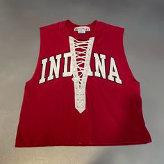 Brand New Reworked Indiana Sleeveless Lace Up Cropped T-Shirt Vintage Red T-shirt For College, Red Graphic Tee Cropped T-shirt, Cheap Sporty University Red T-shirt, Affordable University Red Fan Apparel T-shirt, Red And White Ringer Tee, Small Tank Tops, Indiana University, Crop Tshirt, Top Tee