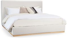 a bed with white linens and pillows on it's headboard, against a white background