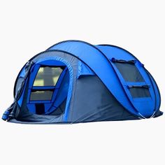 a blue and gray tent sitting on top of a white floor