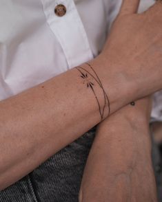 a person with a tattoo on their arm