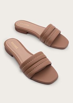 Upper: 100% Bovine leather Lining: Leather Innersole: Leather Sole: P/U Fit Comments: Regular, true to size. Half sizes should size up if regular-wide width or size down if narrow width This KAANAS Staple is back in new hues. Introducing the epitome of minimalist elegance – our Maya Honey slide sandals. Crafted with a two-strap leather upper adorned with subtle stitching, these sandals strike the perfect balance between comfort and style. Versatile and chic, the Maya sandals are suitable for eve Casual Leather Sandals, Latest Ladies Shoes, Shoe Makeover, Half Shoes, Casual Sandals Womens, Pretty Sandals, Latest Sandal, Handmade Leather Shoes, Stylish Sandals