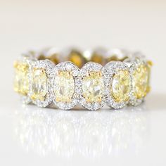 a fancy yellow and white diamond ring