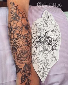 a woman's leg with flowers on it and an image of a flower tattoo