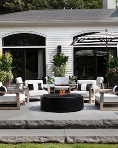 a fire pit sitting in the middle of a patio