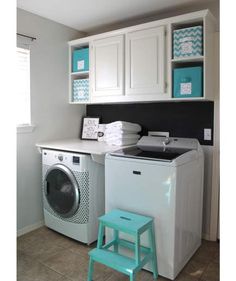 a washer and dryer in a small room