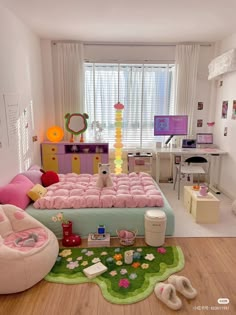 a bedroom with pink and green furniture in it