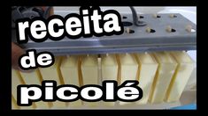 a machine that is cutting cheese into pieces with the words receita de picole