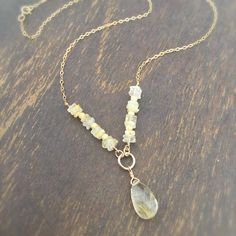 This rutilated quartz necklace created by Jewelry by CARMAL is made of: a rutilated quartz pendant and gemstones, 14K gold filled: link chain and spring clasp closure. This necklace measures 18 inches in length and the pendant measures about 1/2 inch. View more chain necklaces: http://www.etsy.com/shop/jewelrybycarmal?section_id=8001511 All of our jewelry comes wrapped and ready for gift giving! We also offer free standard shipping within the United States. We accept custom orders and would love Gold Prehnite Jewelry As A Gift, Prehnite Gemstone Beads Necklace For Gift, Citrine Gemstone Briolette Necklaces, Rutilated Quartz Necklace, Chain Jewellery, Tear Drop Pendant, Luxe Fashion, Chain Necklaces, Rutilated Quartz