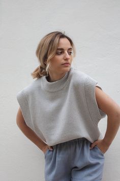 Crew-neck vest from 100% wool. Flattering Outfits, Fast Fashion Brands, Vest Designs, Wool Vest, Vest Outfits, Wool Pants, Cold Season, Light Blue Color, Knit Vest