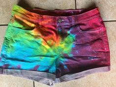 These wonderful Old Navy shorts have been hand dyed in beautiful colors! They feature front and back pockets. Made from 65% cotton, 33% polyester, 2% spandex. Women's Size 10 Waist measures 34" and stretches to 35". They are 13" long with a 3" inseam. These shorts are a one of a kind! Grab them while they're here! Please see our shop at www.doyoudreamoutloud.etsy.com for a flavorful array of tie dyed goods! 129n Acid Wash Bottoms With Built-in Shorts, Hand Dyed Fitted Cotton Bottoms, Fitted Hand Dyed Cotton Bottoms, Multicolor Jean Shorts With Pockets, Fitted Cotton Shorts For Festivals, Hand Dyed Tie Dye Cotton Bottoms, Fitted Tie Dye Short Bottoms, Fitted Tie-dye Short Bottoms, Fitted Hand Dyed Bottoms For Summer