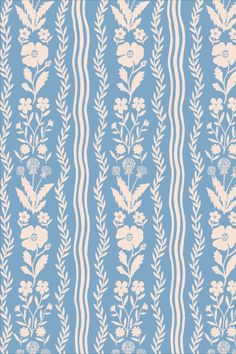 a blue and white floral wallpaper with vertical stripes in the center, on a light blue background