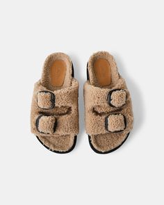 DETAILS The Molly slide is the ideal sandal for anyone who spends a lot of time on their feet. With maximum comfort and coziness in mind with Oh-so-fluffy shearling? and oversized statement buckles it transforms a classic sandal to the ultimate cozy sandal. FEATURES Soft faux shearling upper Soft shearling fur lining Features buckle for adjustable fitting FIT NOTES We suggest sizing up if in between sizes FABRICATION Upper: Synthetic Lining: Synthetic Outsole: Synthetic CARE INSTRUCTIONS Wipe wi Race Wear, Lace Socks, Favorite Daughter, Platform Slippers, Maternity Shops, Kids Sandals, Kids Outfits Girls, Flat Espadrilles, Designer Clothes For Men