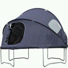 a tent that is sitting on some metal legs