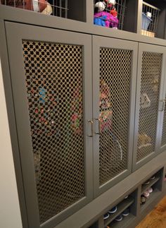 a large gray cabinet filled with lots of bottles