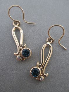 14Kt Gold Blue Topaz Earrings by RichelleJewelry on Etsy, $1018.00 Elegant Hand Forged Blue Earrings, Raw Quartz Crystal, Harrisburg Pa, Citrine Beads, Swirl Earrings, Trendy Nail, Blue Topaz Earrings, Loop Earrings, Topaz Earrings