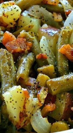 a close up view of cooked vegetables with seasoning