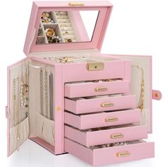 a pink jewelry box with many drawers