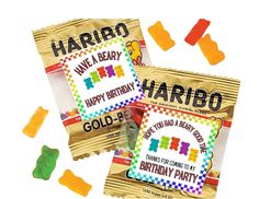 two bags of happy birthday gummy bears next to each other on a white background