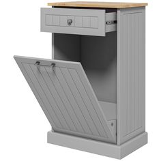 a grey cabinet with a wooden top and bottom opening open to reveal a small drawer