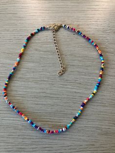 This is a super cute every day seed bead necklace to pair with any outfit! This has multiple different colors and includes extension chain for multiple sizes. Trendy Colorful Necklace With Tiny Beads, Colorful Tiny Beads Casual Necklace, Colorful Casual Necklaces With Tiny Beads, Casual Colorful Tiny Beads Necklace, Casual Colorful Necklace With Tiny Beads, Casual Multicolor Heart Beads Necklace, Casual Multicolor Beaded Necklace With Heart Beads, Trendy Rainbow Beaded Necklaces, Trendy Multicolor Beaded Chain Necklaces