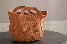 "Granny Crochet Tote BAG, Orange Raffia HandBag, Crochet Raffia Shopper Bag, Orange Raffia Tote, Small Square Raffia Bag, Straw Purse Bag, Raffia Bag Tote, Orange Hand-Knitted Tote Bag Features: 100% Eco-Friendly Raffia Yarn Without Lining & Pocket Dimension Orange Natural Color: 20x20 cm. / 7.8\"x7.8\" ( It consists of 4 square pieces ) 100% Eco-Friendly Raffia Yarn Brown Raffia Yarn Without Lining & Pocket **Fractions rounded up in inches Please ask for Fast Shipping Care: Do not contact with Raffia Handbag, Handbag Crochet, Straw Purse, Knitting Tote Bag, Knitting Tote, Crochet Tote Bag, Raffia Bag, Crochet Tote, Orange Bag