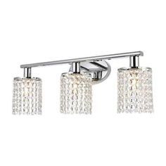 three light bathroom fixture in chrome finish with clear crystal glass shades on the top and bottom