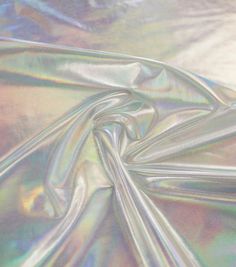 *We are currently running a few days behind with orders. Thank you for your understanding and patience.  **Due to SO MANY issues with USPS - we STRONGLY ENCOURAGE you to purchase the UPS Upgrade with your order located here: https://www.etsy.com/listing/926751536/ups-upgrade This opal iridescent holographic nylon/spandex is a 4-way stretch, medium/thick-weight fabric. The hologram foil design shows gorgeous rainbow colors in the light. Use this fabric for gorgeous apparel such as skirts, tops, and dresses.  This fabric is sold by-the-yard. For a swatch, please send your address in a message with the name of the swatch you'd like. 92% Nylon/8% Spandex Silver Opal on White Background Don't forget your matching mask! found here:   https://www.etsy.com/listing/951431450/create-your-own-contour Grey Tapestry, Holographic Fabric, Lame Fabric, Art Appliqué, Stretch Denim Fabric, Velour Fabric, Floral Tapestry, Craft Store, Design Show