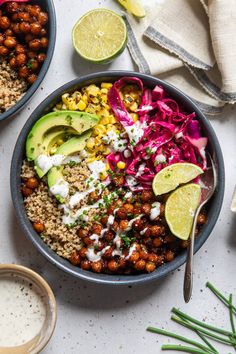 two bowls filled with beans, rice and avocado on top of a table