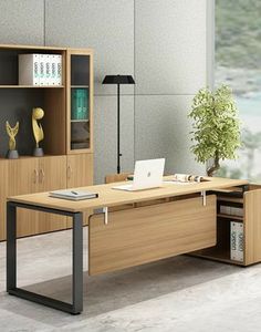 an office desk with bookshelf and bookcase