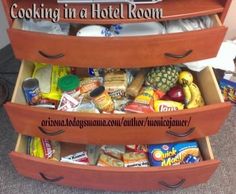 an open suitcase with food in it and the words cooking in a hotel room