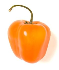 an orange bell pepper is shown against a white background with clipping to the side