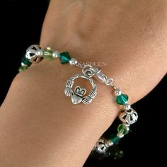 "This is a stunning Swarovski Crystal handmade bracelet. SIMPLE BUT ELEGANT PERFECT IRELAND FRIENDS GIFTS /WEDDING GIFT FOR BRIDE / BRIDESMAIDS / LADY! This bracelet is made wit 6 and 7mm Swarovski Crystal beads, Sterling Silver Barrel shaped beads, sterling silver beads, sterling silver clasp and pewter Irish Claddagh charm. Crystal Colour: Emerald, Peridot The bracelet measures 7 1/2\" long (19cm). The crystals of this finished product are being manufactured by D. Swarovski & Co. \"Swarovs Bridal Foot Jewelry, Loyalty Friendship, Wedding Gift For Bride, Symbol Jewelry, Irish Claddagh, Friendship Symbols, Bracelet Christmas, Sterling Silver Anklet, Irish Jewelry