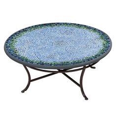 a blue and green mosaic table with metal legs