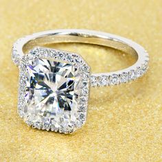 14K Gold Classic 2.7ct Radiant-cut Halo Moissanite and Diamond Engagement Ring | Earthena Jewelry Classic Halo Engagement Ring, Ring Cuts, Classic Romance, Basket Setting, Ring Settings, Diamond Halo Engagement Ring, Radiant Cut Diamond, Classic Engagement Rings, Ring Ideas