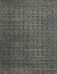 an area rug with many different colors and patterns