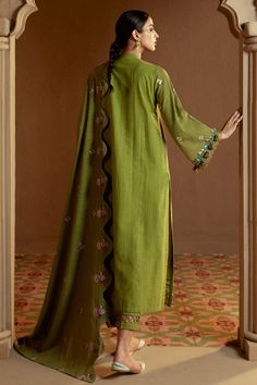 Product Details SHIRTDyed & embroidered front and sleeves (Khaddar)Dyed backTROUSERKhaddar dyed trouserDUPATTAKhaddar embroidered shawlATTRIBUTE Introduce an air of elegance with our GREEN OASIS-3 PC KHADDAR EMBROIDERED SUIT. The Khaddar dyed and embroidered front and sleeves add a touch of sophistication, while the dyed back and trouser complete the look. The Khaddar embroidered shawl provides the perfect finishing touch. Designer Green Cotton Unstitched Suit, Green Cotton Unstitched Suit For Designer Wear, Green Embroidered Chanderi Lawn Suit, Embroidered Green Chanderi Lawn Suit, Green Chanderi Lawn Suit With Long Sleeves, Green Embroidered Lawn Suit In Cotton Silk, Green Cotton Silk Kurta With Embroidered Border, Green Cotton Kurta With Embroidered Border, Green Embroidered Cotton Silk Lawn Suit