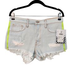 Nwt Free People X Sandrine Rose Cutoff Shorts Highlighter Yellow Neon Green Distressed New With Tags Excellent Condition- No Visible Flaws Edgy Side Adjustable Functional Neon Side Zippers Distressed Detail Frayed Hem Light Wash Blue Color Button Fly 100% Cotton Belt Loops Pockets Style: R1012-D027-Yelw-D1 Made In Usa Approx Measurements 14” Waist 10” Rise 3” Inseam Questions? Leave A Comment Below! Other Listings: Boho, Western, Cowboy, Bohemian, Anthropologie, Free People, Johnny Was, Antique, Yellow Neon, Free People Shorts, Cutoff Shorts, Size 28 Jeans, Cut Off Shorts, Johnny Was, Neon Green, Rose Cut, Highlighter