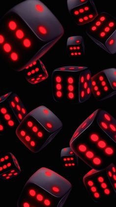 dices with red lights on them are in the middle of a black background,